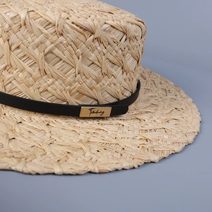 Flat top raffia straw hat for women with black leather band and gold metal detail