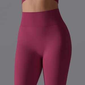 Detail of high waist seamless knit leggings showing ribbed waistband and textured fabric