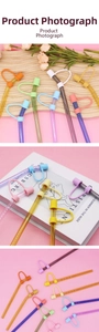 Macro shot of 10mm colorful silicone straw covers on clear glass reusable straws