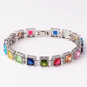 Elegant silver bracelet featuring colorful square-cut cubic zirconia gemstones in a row