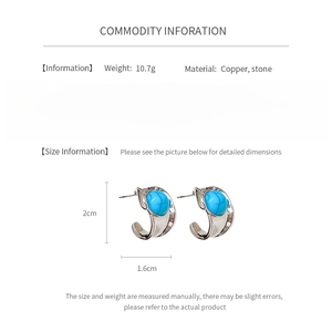 Detailed size and material info for vintage silver C-shaped earrings with blue stone