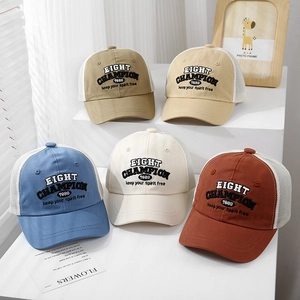 Close-up of embroidered mesh baseball caps in various colors with breathable net back