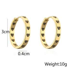 Detail showing dimensions 3cm diameter gold hoop earrings with black heart zircon stones
