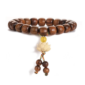 Deep brown rosewood Buddhist beads bracelet with carved lotus pendant and woven cord