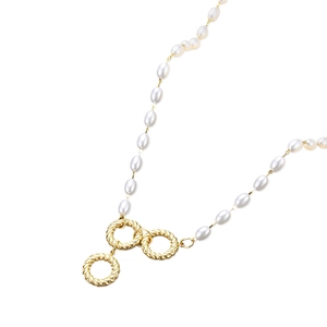 Elegant pearl and gold spiral metal link necklace set against a clean white background