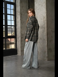 Vintage oversized plaid shirt in dark green and brown with long sleeves and flap pockets