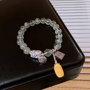 S925 silver beaded bracelet with green phantom quartz lotus and amber honey wax charm