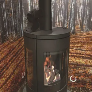 Detail of a 4-blade heat powered stove fan on a modern black cylindrical wood fireplace