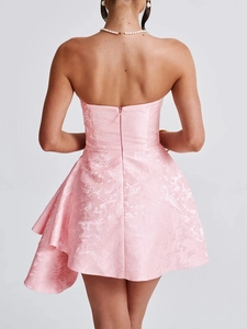 Detail of pink jacquard tube dress with low back design and hidden zipper closure