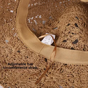 Detail view of the straw hat featuring an adjustable inner string for a customized fit