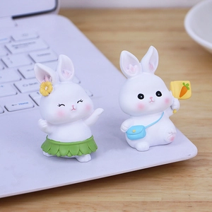 Cute white bunny figurines for car dashboard and desk decor with floral and bag details