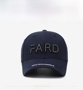 Detail of navy cotton twill baseball cap featuring 3D FARD embroidery and white lettering