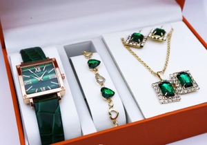 Detailed set featuring green emerald quartz watch and matching luxury jewelry in gift box