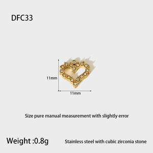 Detailed view of 18k gold plated heart pendant with cubic zirconia inlay and 11mm size