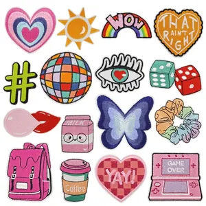 Macro detail of 16-piece colorful embroidered patches for DIY clothes and bags