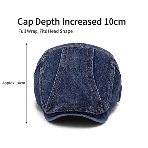 Classic dark blue washed denim flat cap with vintage yellow topstitching on white background