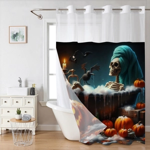 Detail view of Halloween shower curtain with skeleton and pumpkins in a bathroom