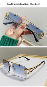 Close-up of gold leopard head emblem and blue gradient lenses on rimless sunglasses
