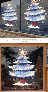Blue Christmas tree window sticker with Merry Christmas text on a wooden glass pane