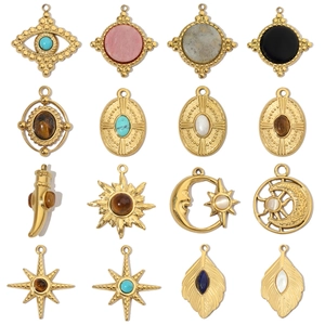 Collection of golden necklaces with colorful pendants featuring celestial and mystic motifs