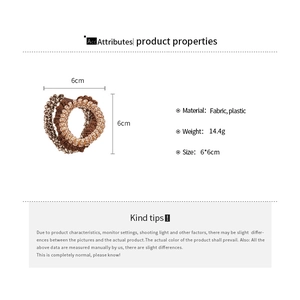 Detailed view of woven fabric elastic hair ties with size and material specifications
