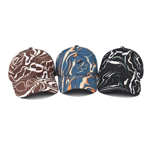 Three tie-dye marble print baseball caps in brown, blue, and black for outdoor fashion