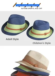 Detail of foldable woven straw sun hats for parent and child with colorful bands