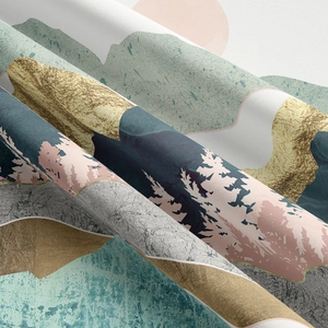 Detail shot showing the thick fabric texture and artistic mountain print of the tapestry