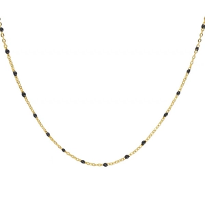 Elegant gold chain necklace with black enamel beads in a minimalist choker style