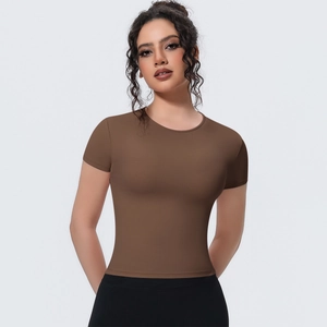 Close-up of a slim fit brown yoga t-shirt featuring breathable fabric and a round neck