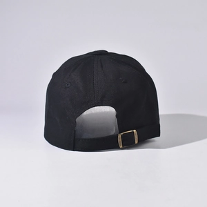 Detail of the distressed denim baseball cap back with antique bronze metal buckle