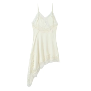 Detail of off-white satin dress showing delicate lace trim and silky fabric texture