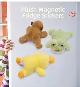 Plush animal fridge magnets featuring a brown bear, green frog, and yellow duckling set