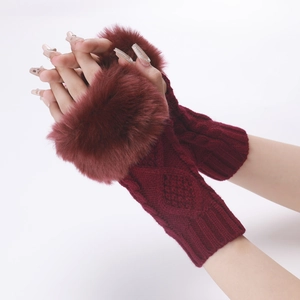Detail of burgundy diamond-pattern knit fingerless gloves with plush faux fur cuffs