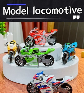 Detailed display of toy motorcycle keychains in red, green, yellow, blue, and white colors