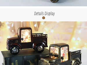 Detail view of vintage Christmas truck lanterns with Santa Claus and sparkling snow interior