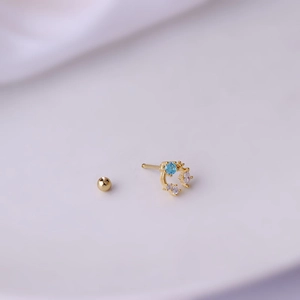 Gold titanium steel curved ear stud with blue and white zircon gems and ball back