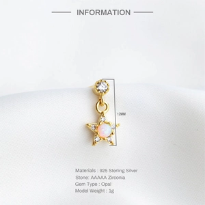 Close-up of 925 sterling silver star earrings with pink opal and white zircon detailing