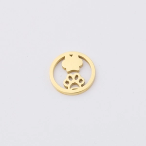 Detailed view of a golden hollow circle charm featuring two paw prints for DIY jewelry