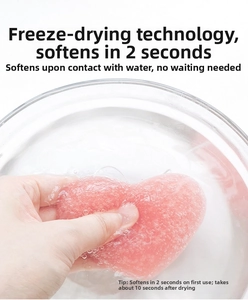 Macro shot showing pink heart sponge absorbing water instantly for deep facial cleansing