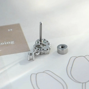 Silver celestial moon and heart ear stud with zircons and secure screw back design