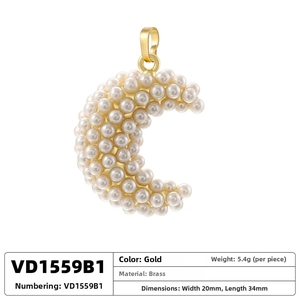 Detailed view of crescent moon pendant with pearls and dimensions 20mm by 34mm