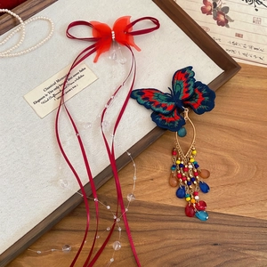 Exquisite butterfly hair clips with pearl tassels and embroidery in a traditional style
