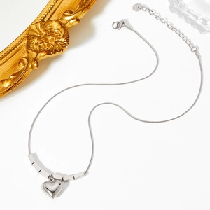 Polished silver heart pendant necklace in high-quality stainless steel with snake chain