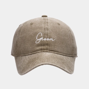 Vintage washed khaki cotton baseball cap featuring white embroidered Groom lettering