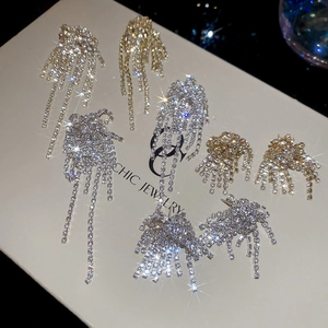 Sparkling tassel earrings with zircon fireworks design in gold and silver finish