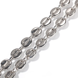 Macro view of polished silver stainless steel coffee bean link chain with high gloss finish