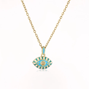 Macro view of Bohemian evil eye pendant with blue enamel and gold-plated chain