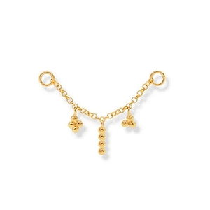Detail of gold S925 sterling silver ear chain with geometric bead pendants and metal links