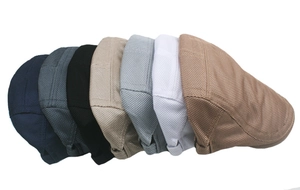 Close-up of breathable mesh newsboy caps in seven colors for summer sun protection